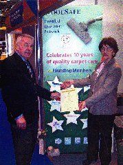 Receiving a certificate for ten years of service to the Networ