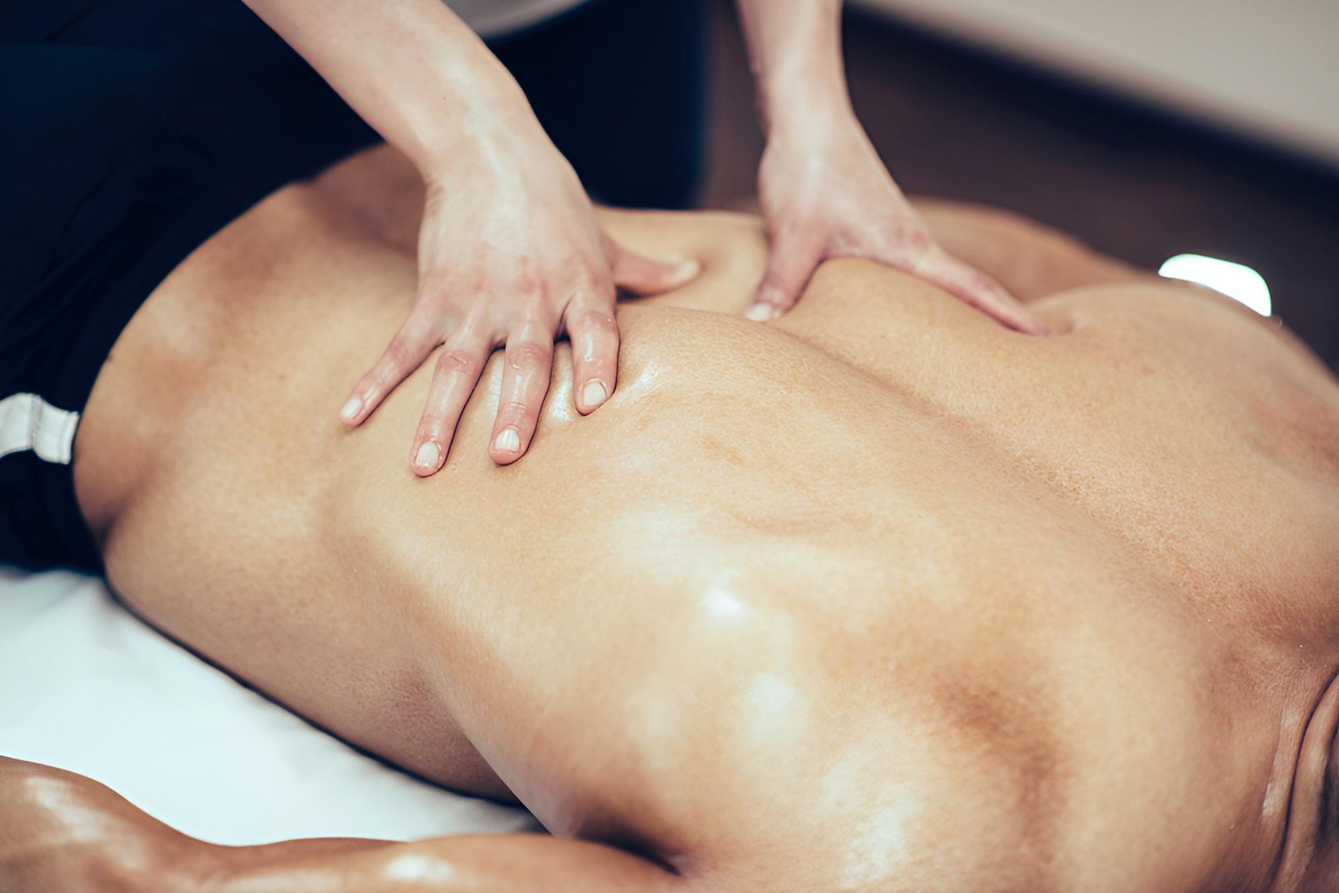 Man Receiving a Remedial Back Massage — Nonny Thai Healing Massage In Coffs Harbour, NSW