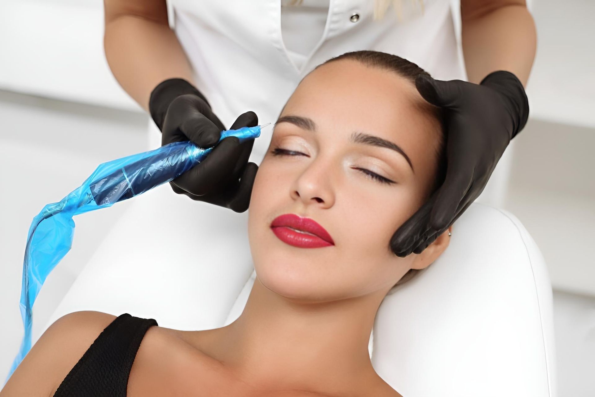 A Woman is Getting a Permanent Makeup Treatment on Her Face — Nonny Thai Healing Massage In Coffs Harbour, NSW