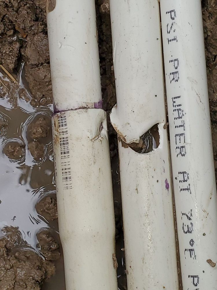 A couple of white pipes that say psi on them