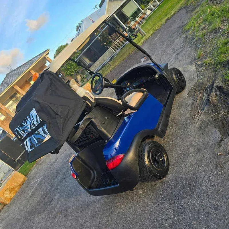 Blue Mobility Scooter With a Black Cover — Lift It Equipment in Tuggerah, NSW