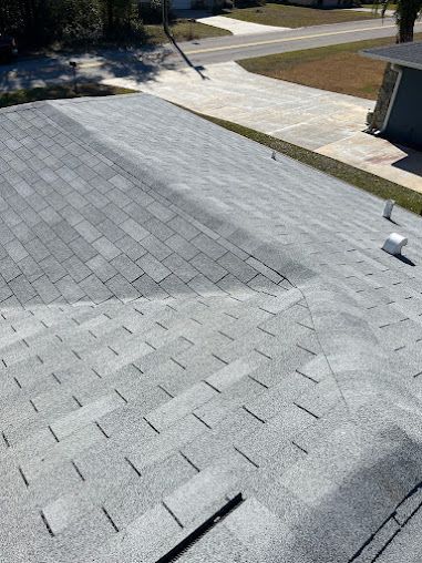 An aerial view of a roof with a lot of shingles on it.