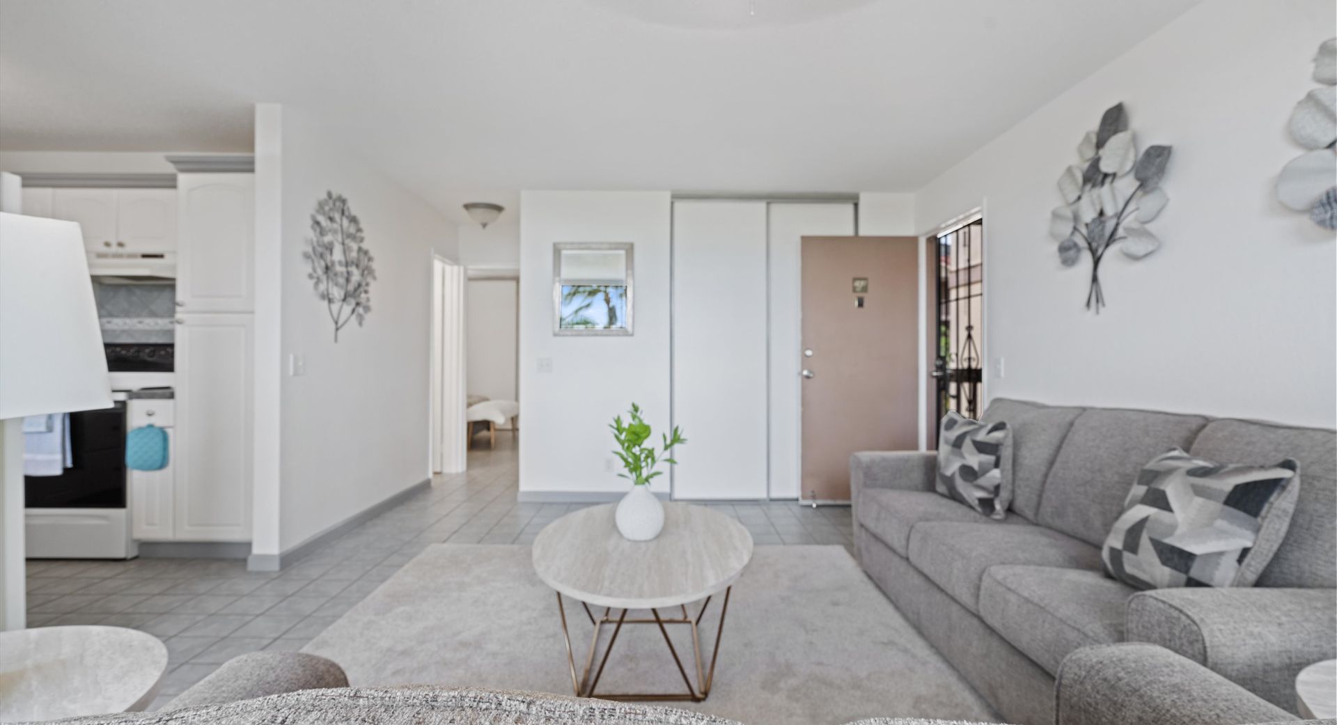 A living room with a couch and a coffee table