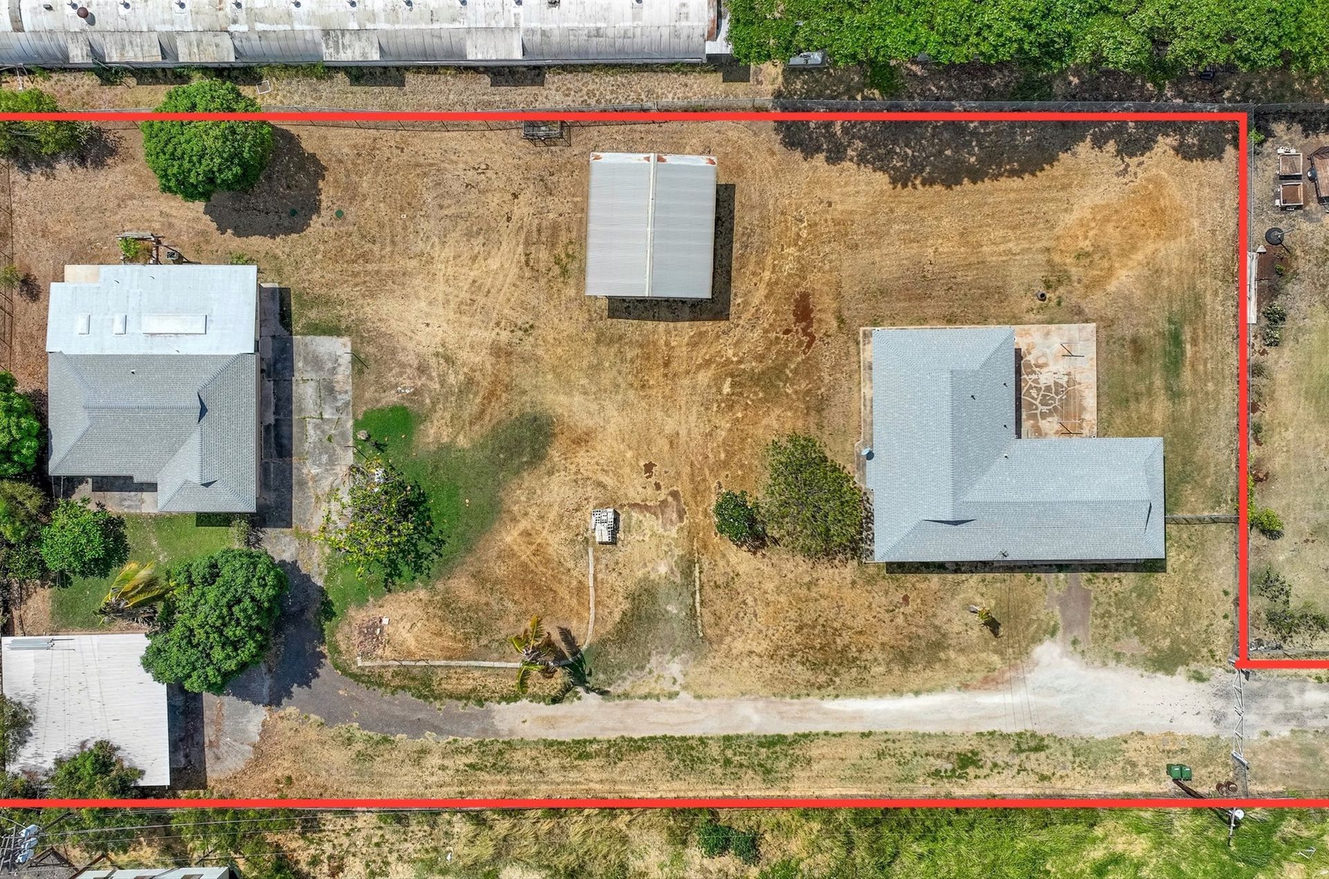 An aerial view of a house with a red line around it
