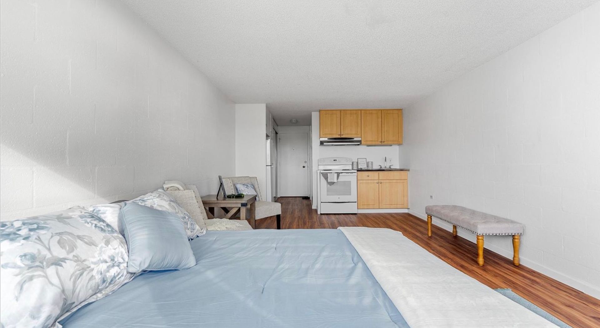 There is a bed in the middle of the room.