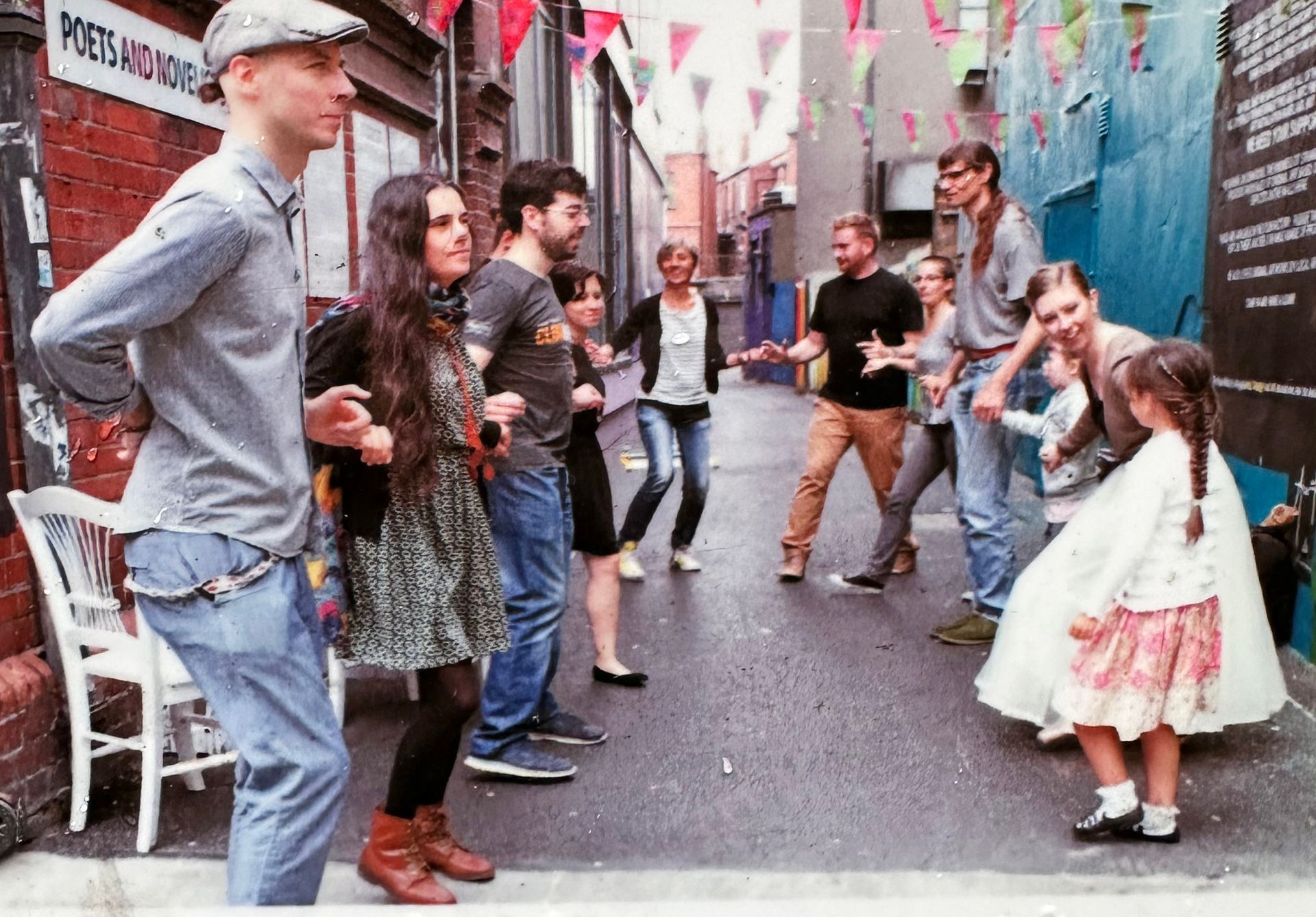 People dance outside the Icon Factory in the now accessible laneways