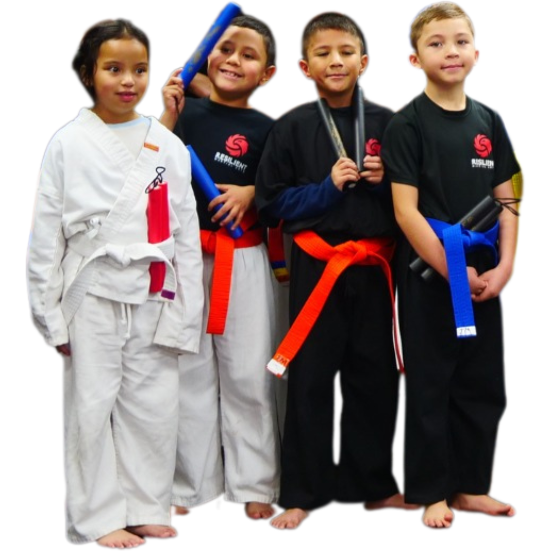 A boy and a girl are practicing karate together.