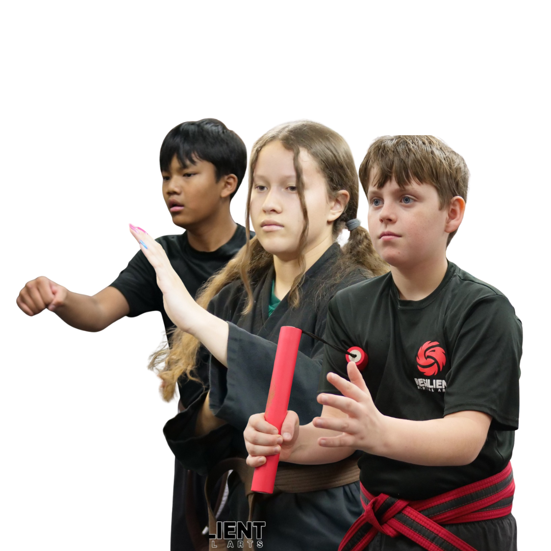 two adults sparring in martial arts