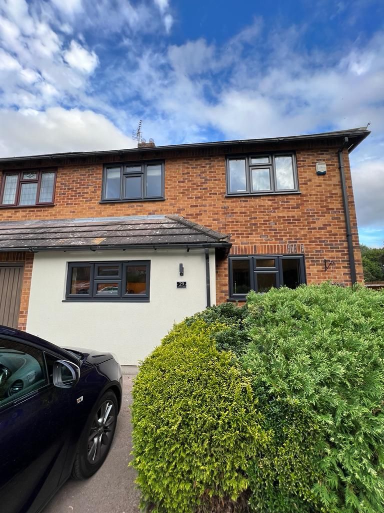 front of a brick house .