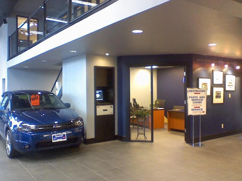 Front View of Office With A Car — Commercial