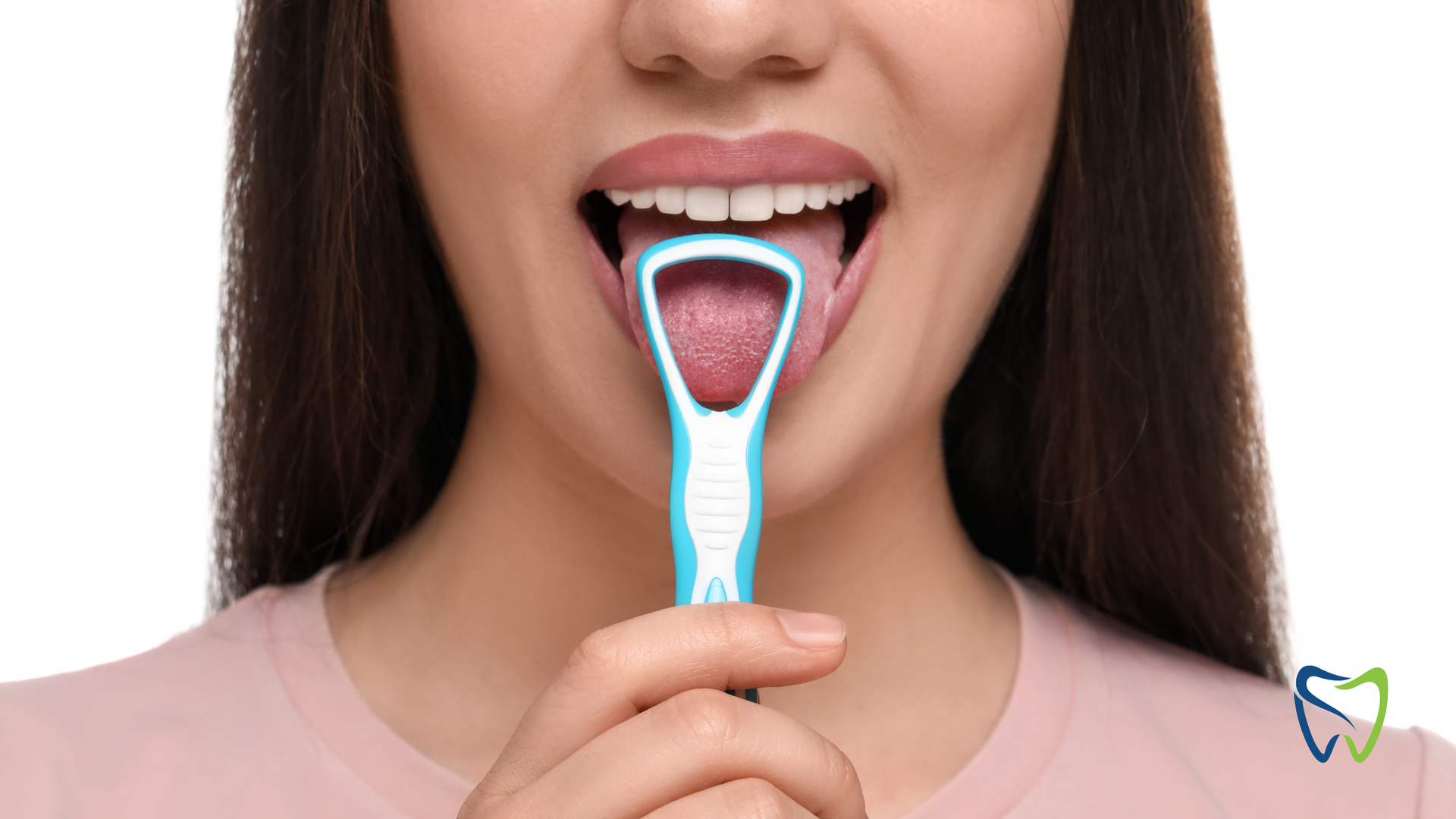 A woman is holding a tongue scraper in her mouth.