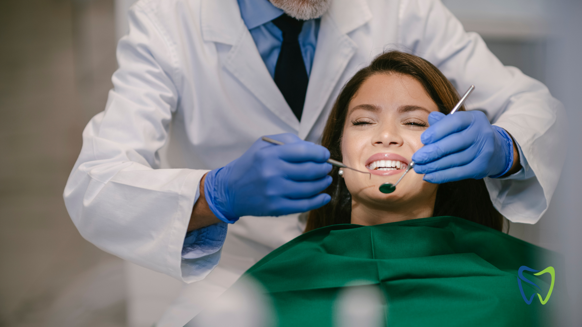 A dentist is examining a woman 's teeth in a dental office.