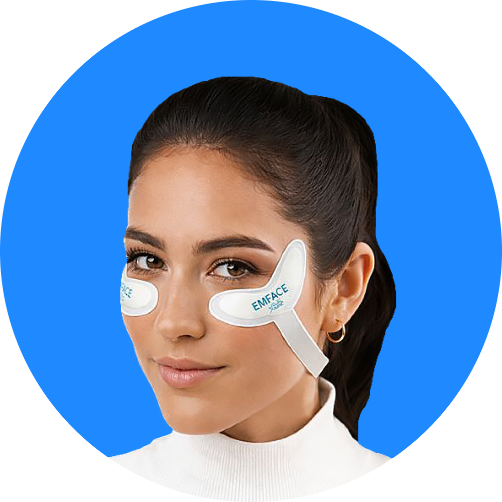 Woman wearing EMFACE eye patches, blue background.
