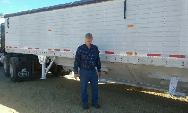 Client Blue Shirt | Viroqua, WI | Bruce Hill, LLC