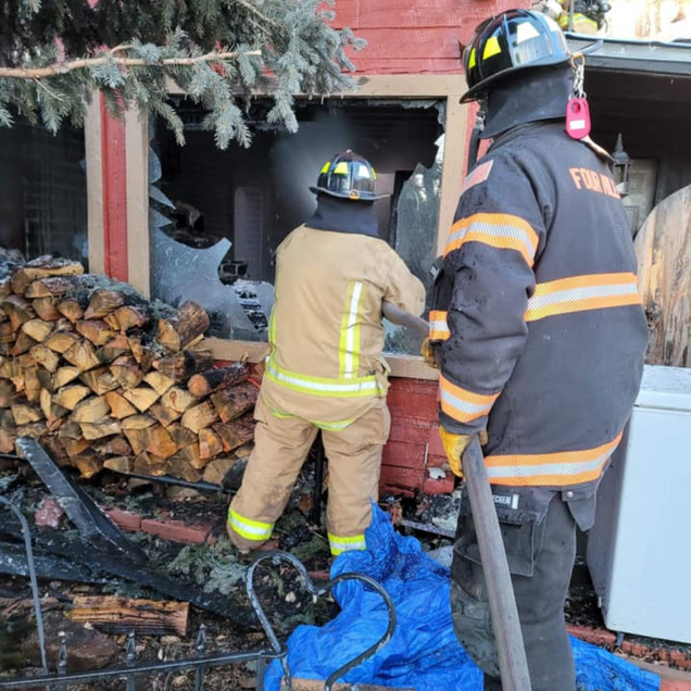 Firefighters at a house fire.