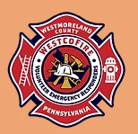 Westmoreland County, PA fire department emblem with tools and state outline.