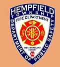 Hempfield Township Fire Department badge. Blue, red, and white shield with a Maltese cross and text.