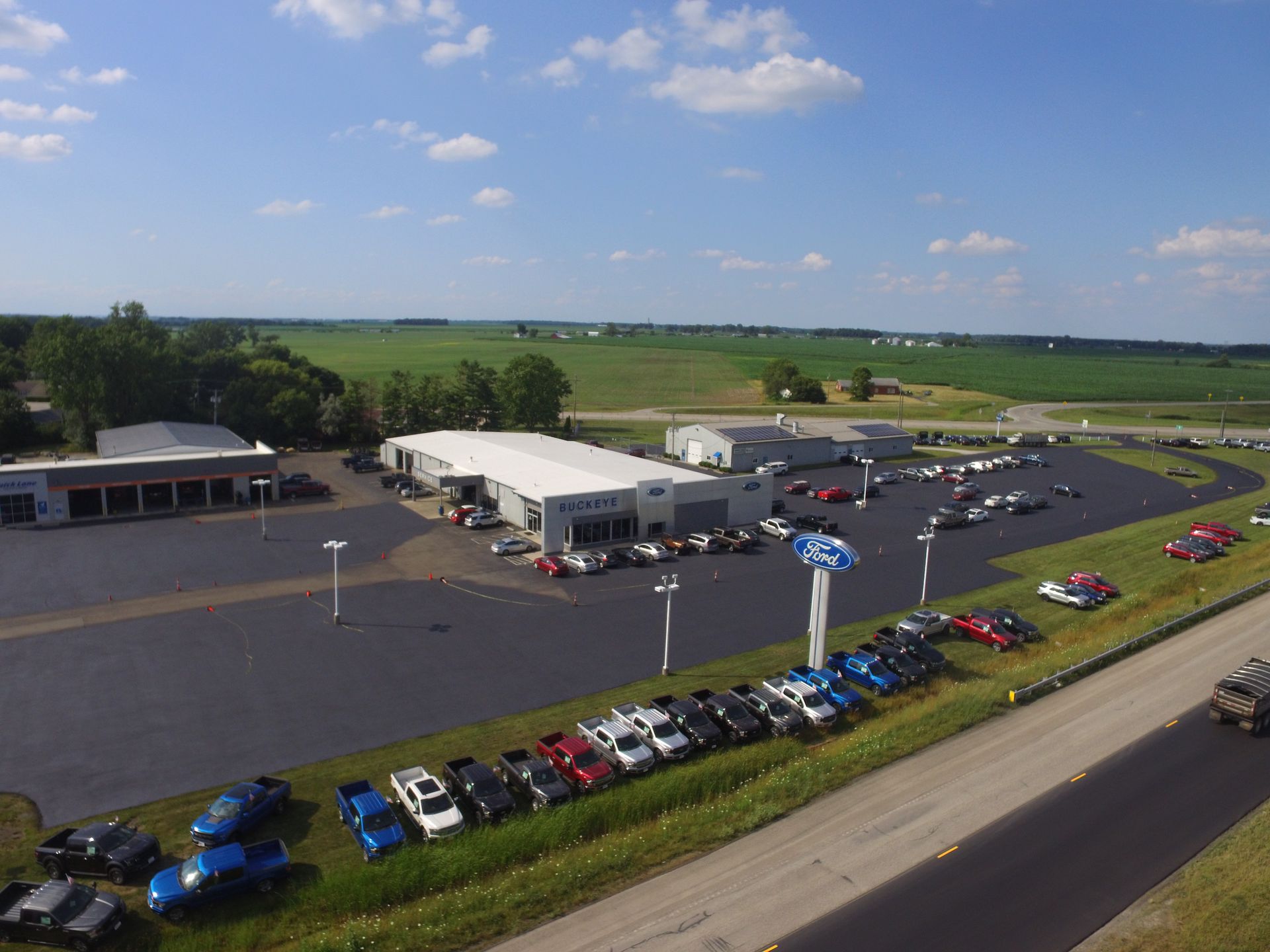 newly sealcoated commercial parking lot