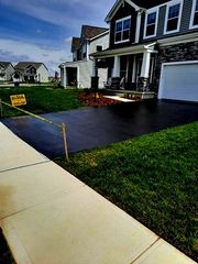 image of newly sealcoated driveway