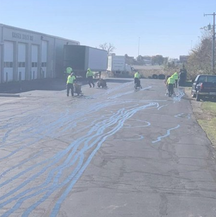 image of allseal team crack filling a parking lot
