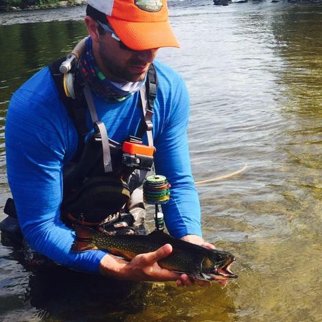 Kyle LeDuc catching a fish.