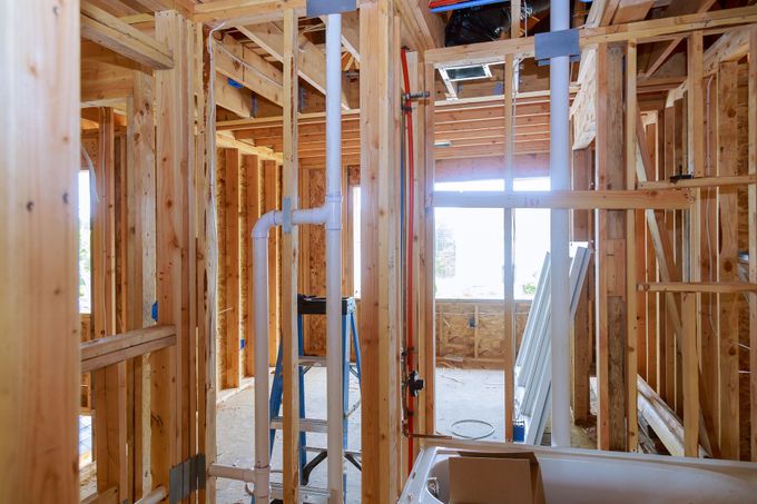 Under Construction with A Ladder and Pipes - Bondurant, IA - Iowa Plumbing LLC