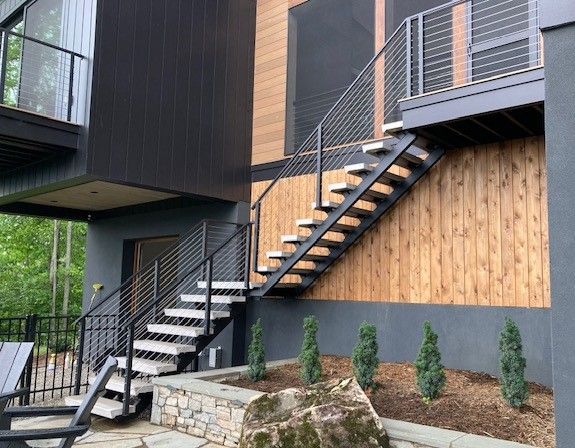 A set of stairs leading up to the second floor of a house.