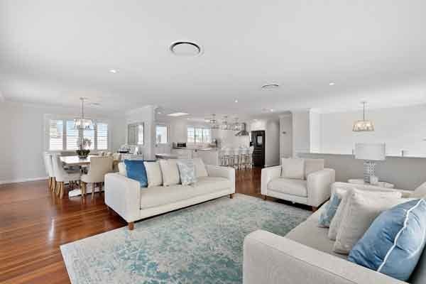 living room with white couches