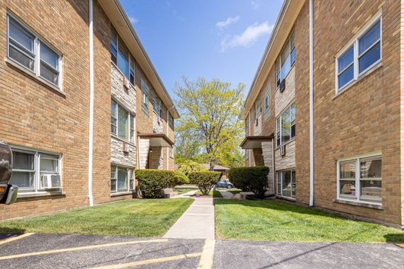 Lake Street Apartments Exterior with walkway in between apartments