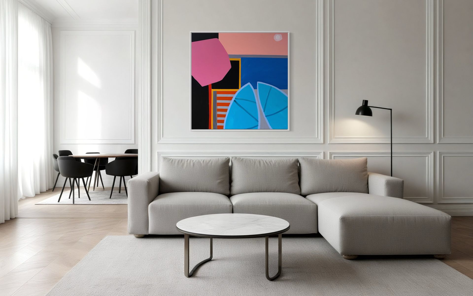 There is a painting on the wall above the couch in the living room.