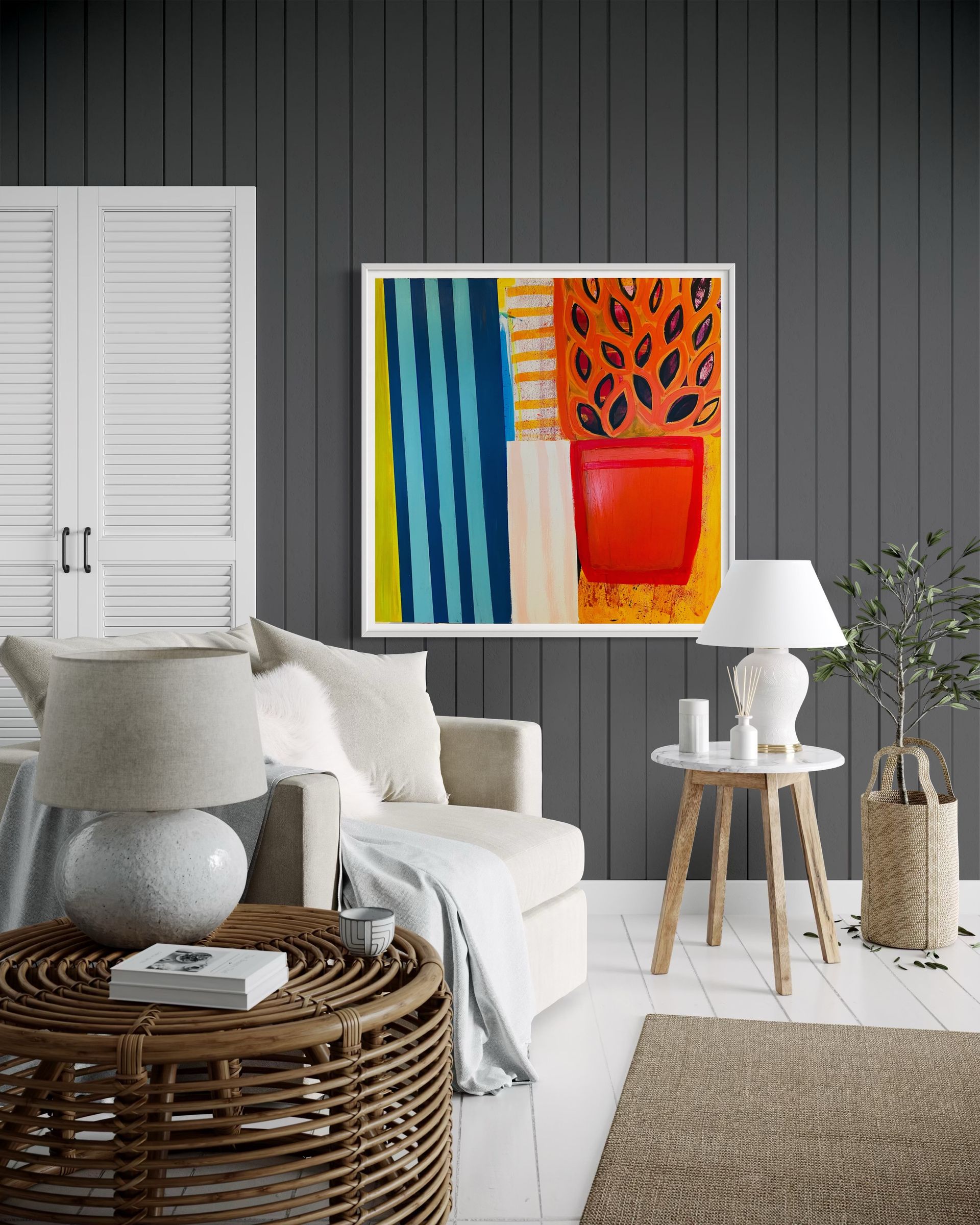 A living room with a couch , chair , coffee table and painting on the wall.