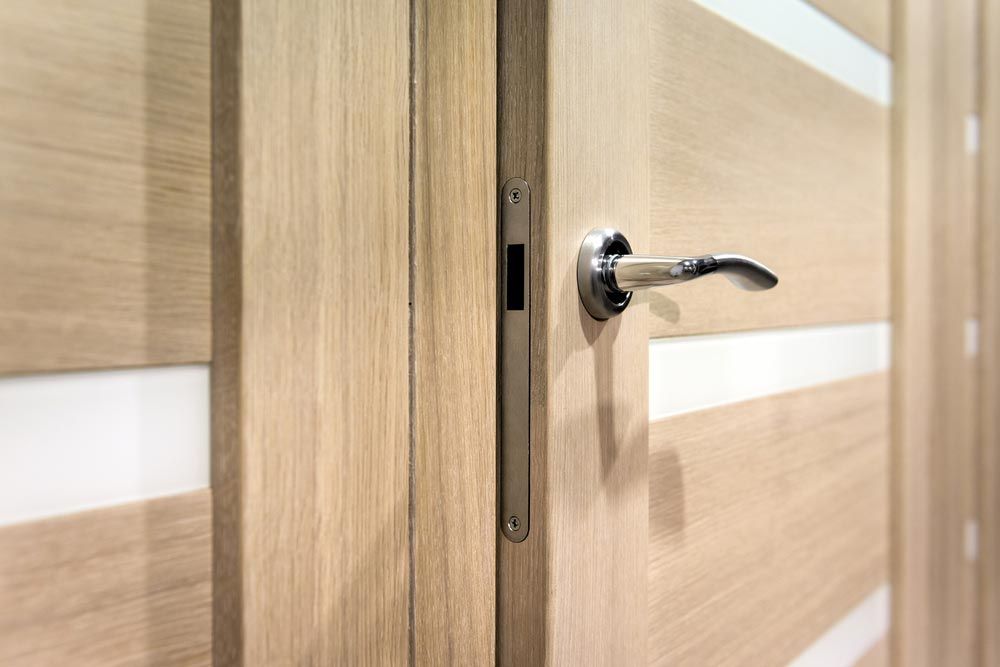 Wooden Open Door With Silver Door-Handle — Building Supplies in Narrabri, NSW