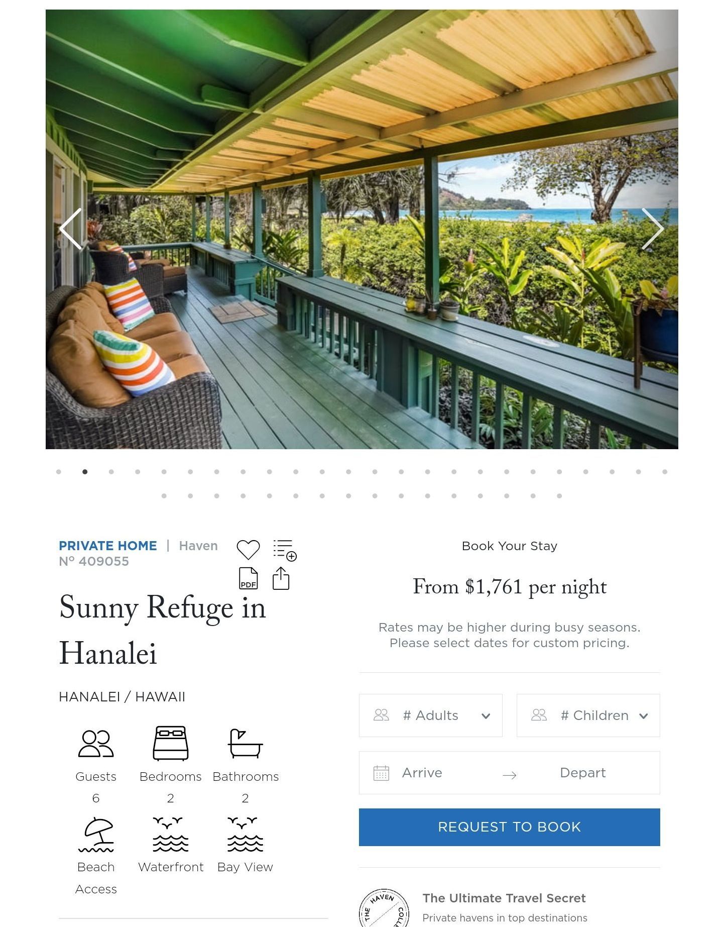 There is a picture of a porch with a view of the ocean.