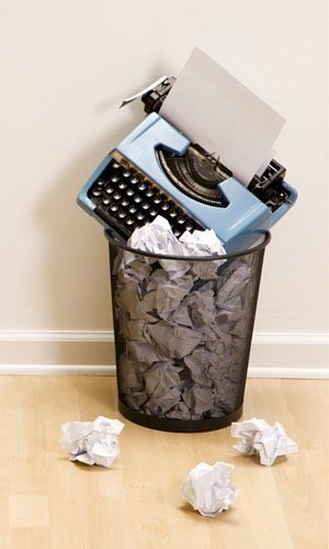 Typewriter in the bin.