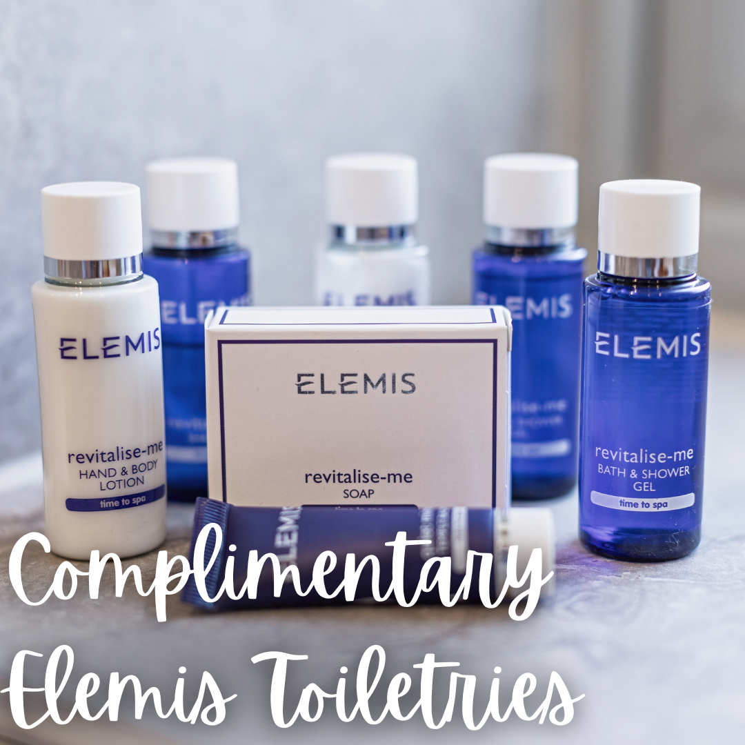 Several bottles of elemis toiletries are on a table