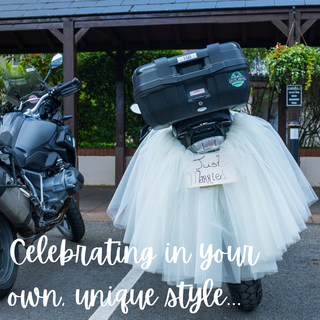 A motorcycle with a tutu on the back of it