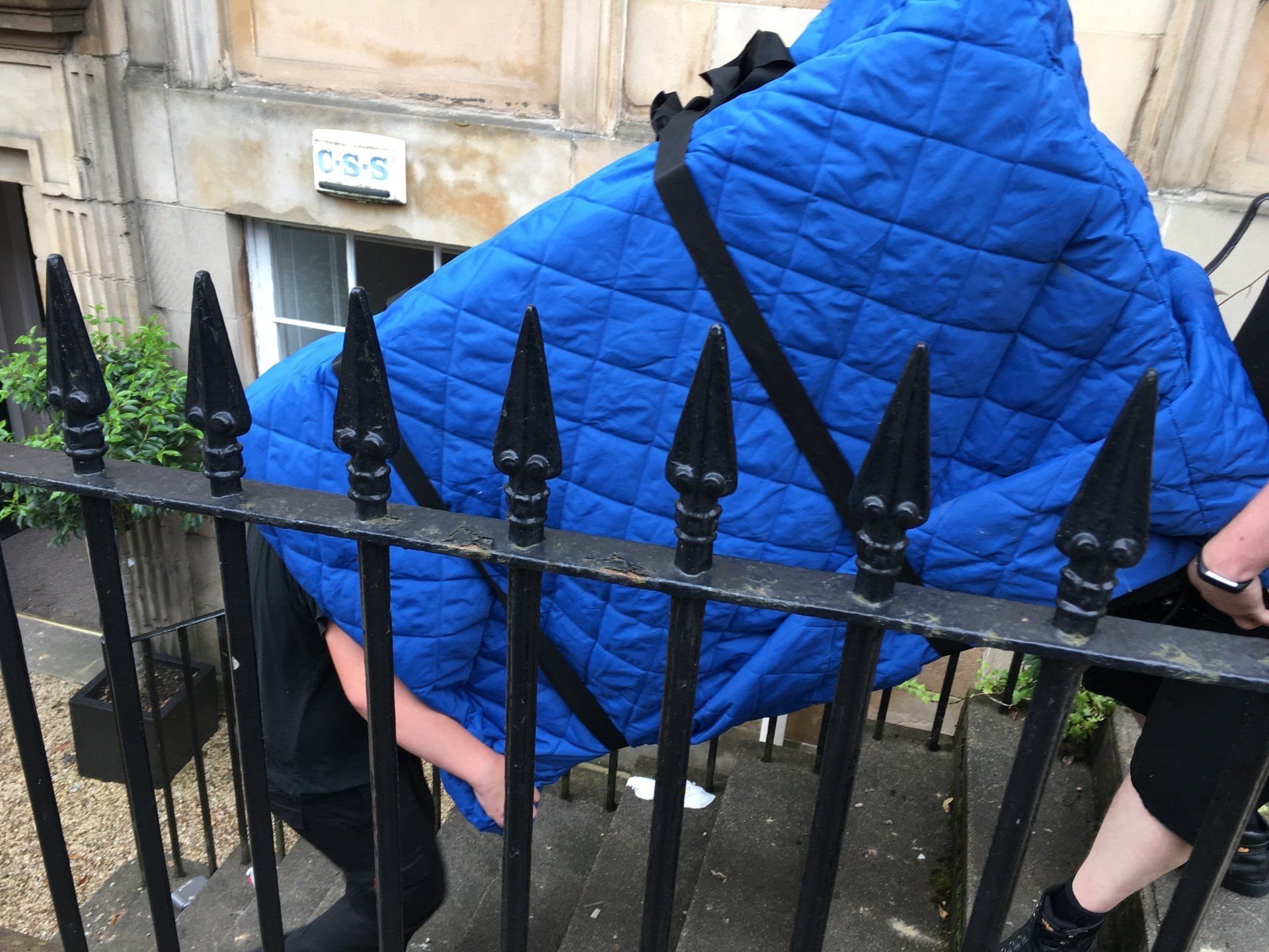 Removals company Glasgow working with protective furniture covers on house removals