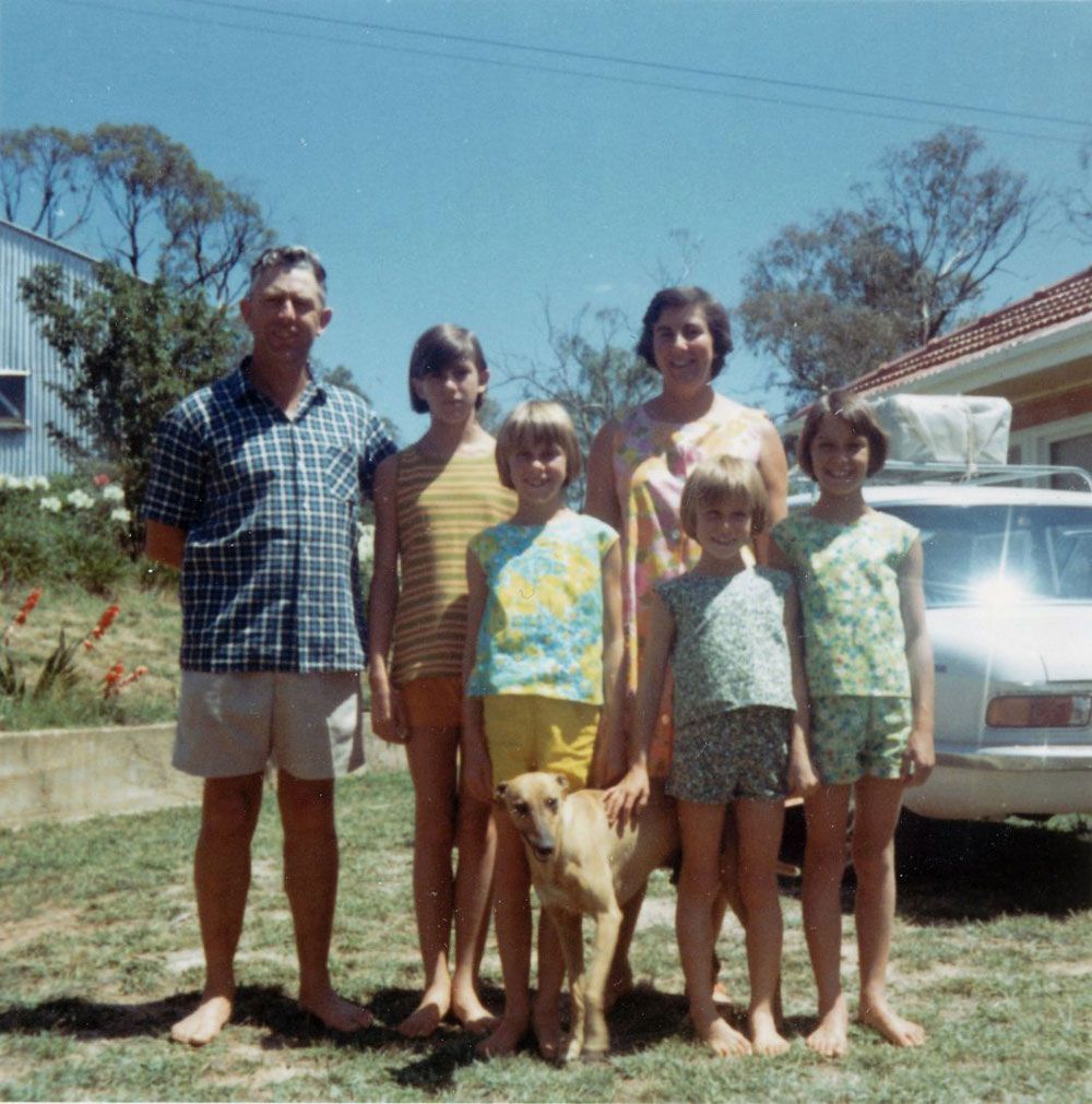 A Group of People Posing for a Picture With a Dog — Lakeview Luxury Retreat in Canobolas, NSW