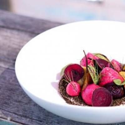 Plate Topped With Radishes and Beets on a Wooden Table — Lakeview Luxury Retreat in Canobolas, NSW