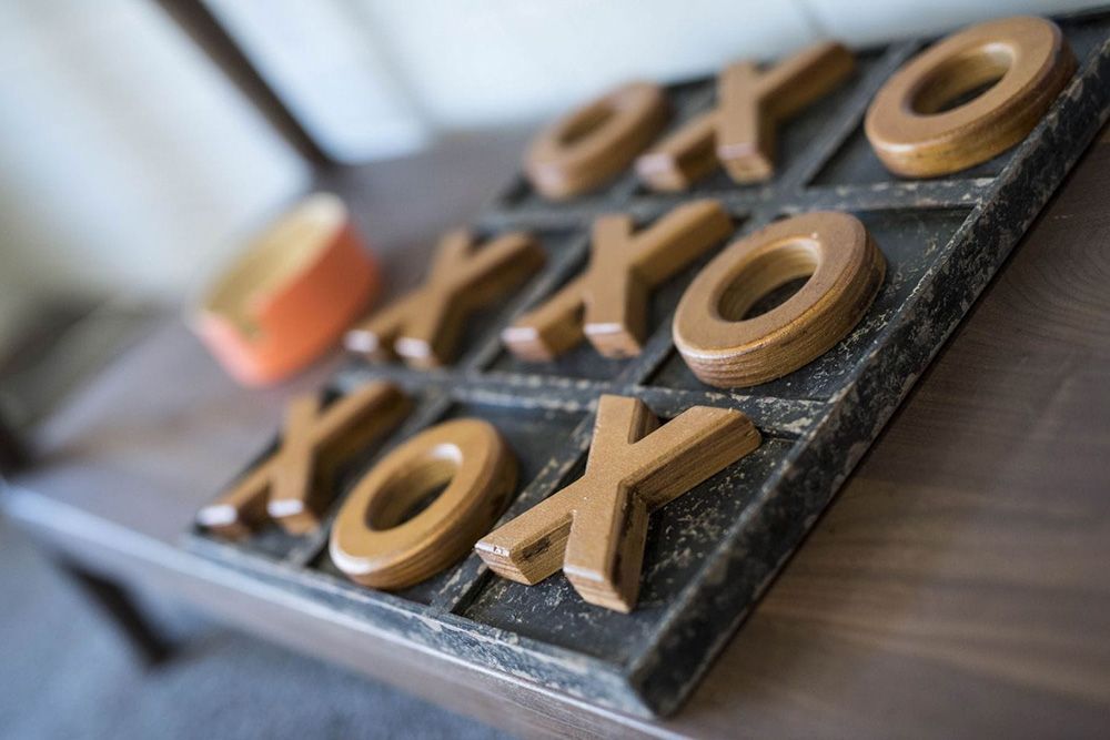 A Close Up of a Tic Tac Toe Game on a Table — Lakeview Luxury Retreat in Canobolas, NSW