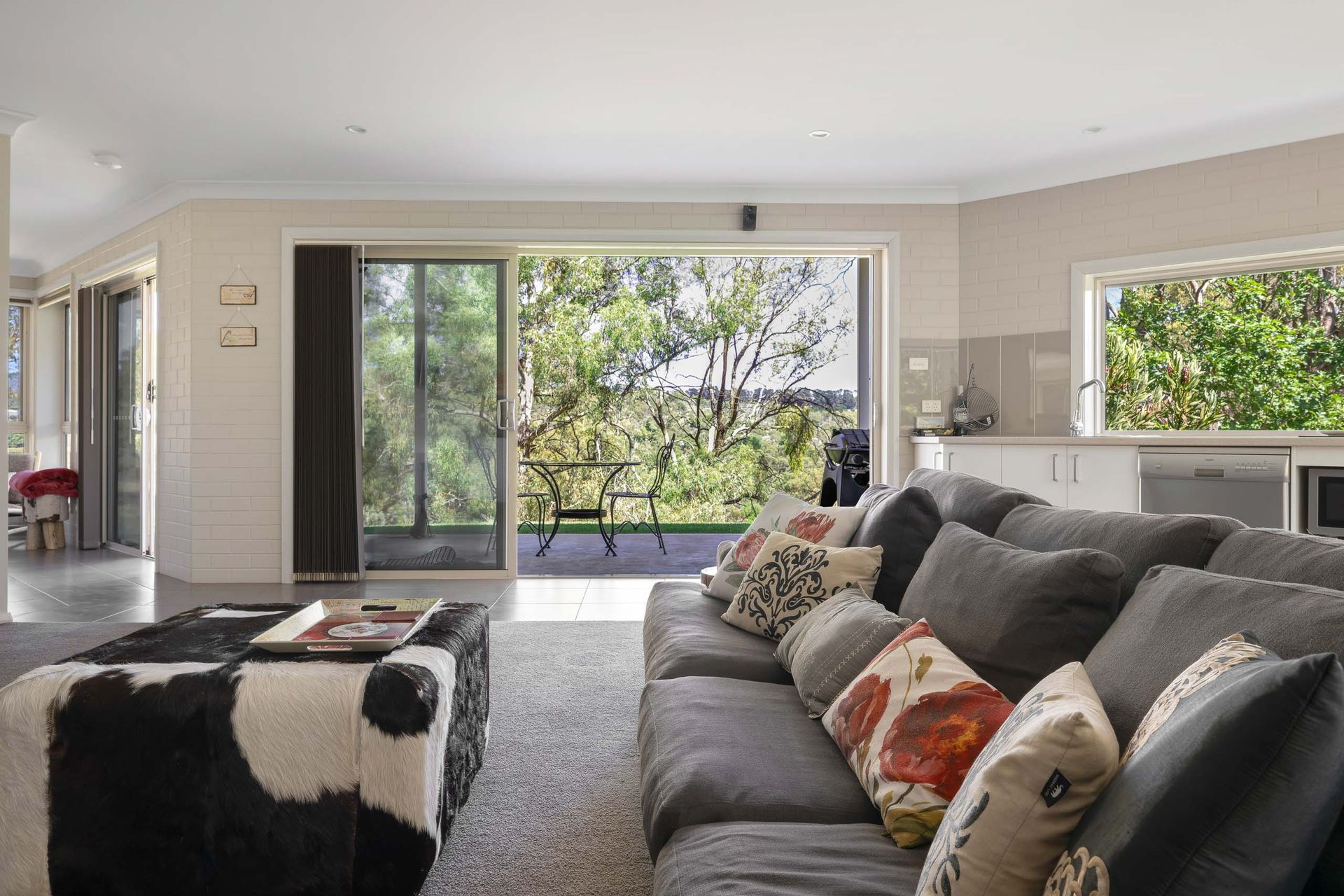 A Bedroom With a Table, Mirror, Television and a Bed — Lakeview Luxury Retreat in Canobolas, NSW