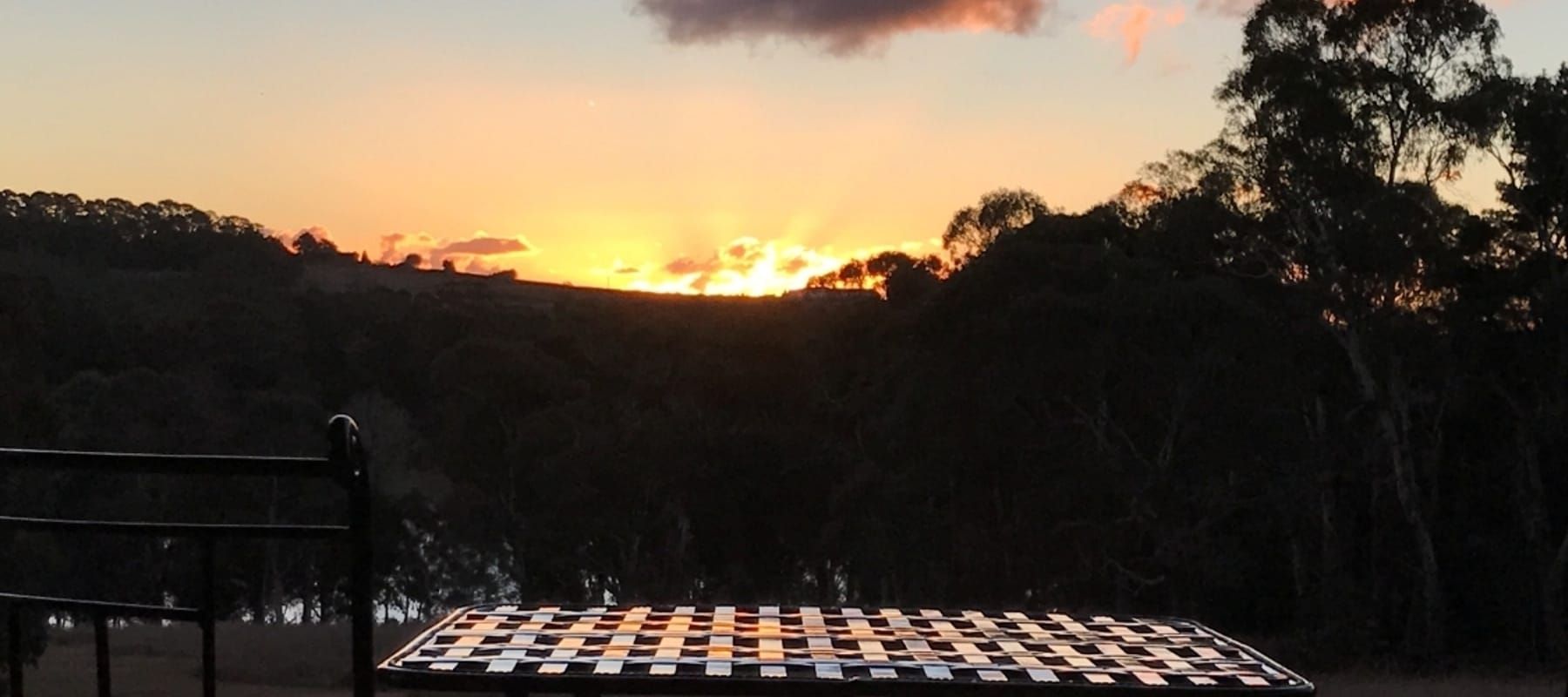 A Black and White Photo of a Fence in the Snow — Lakeview Luxury Retreat in Canobolas, NSW