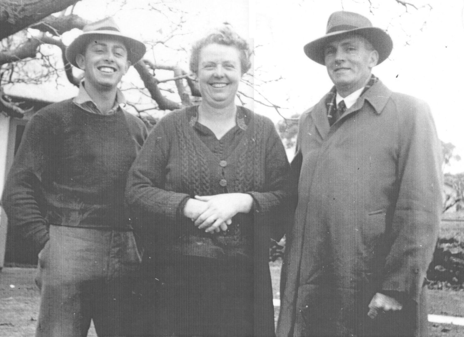 A Black and White Photo of Three People Standing Next to Each Other — Lakeview Luxury Retreat in Canobolas, NSW