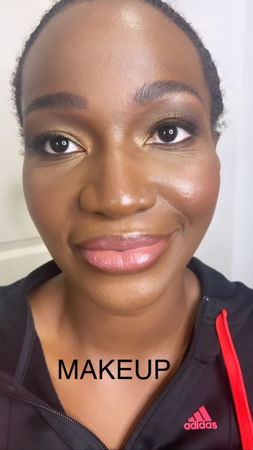 A close up of a woman 's face with the word makeup on it