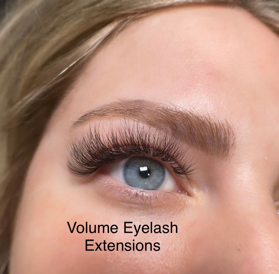 A close up of a woman 's eye with volume eyelash extensions