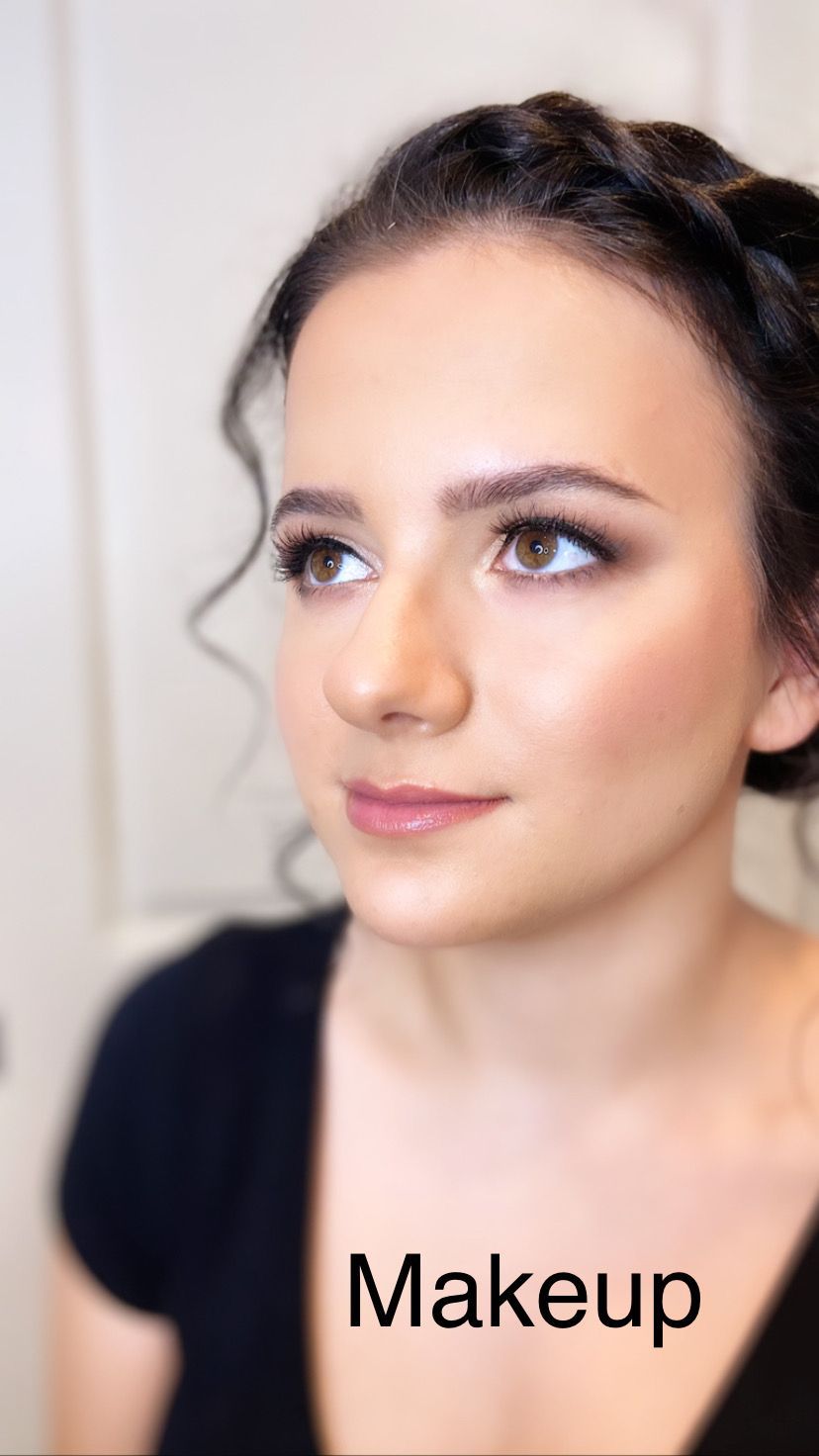 A close up of a woman 's face with the word makeup on the bottom