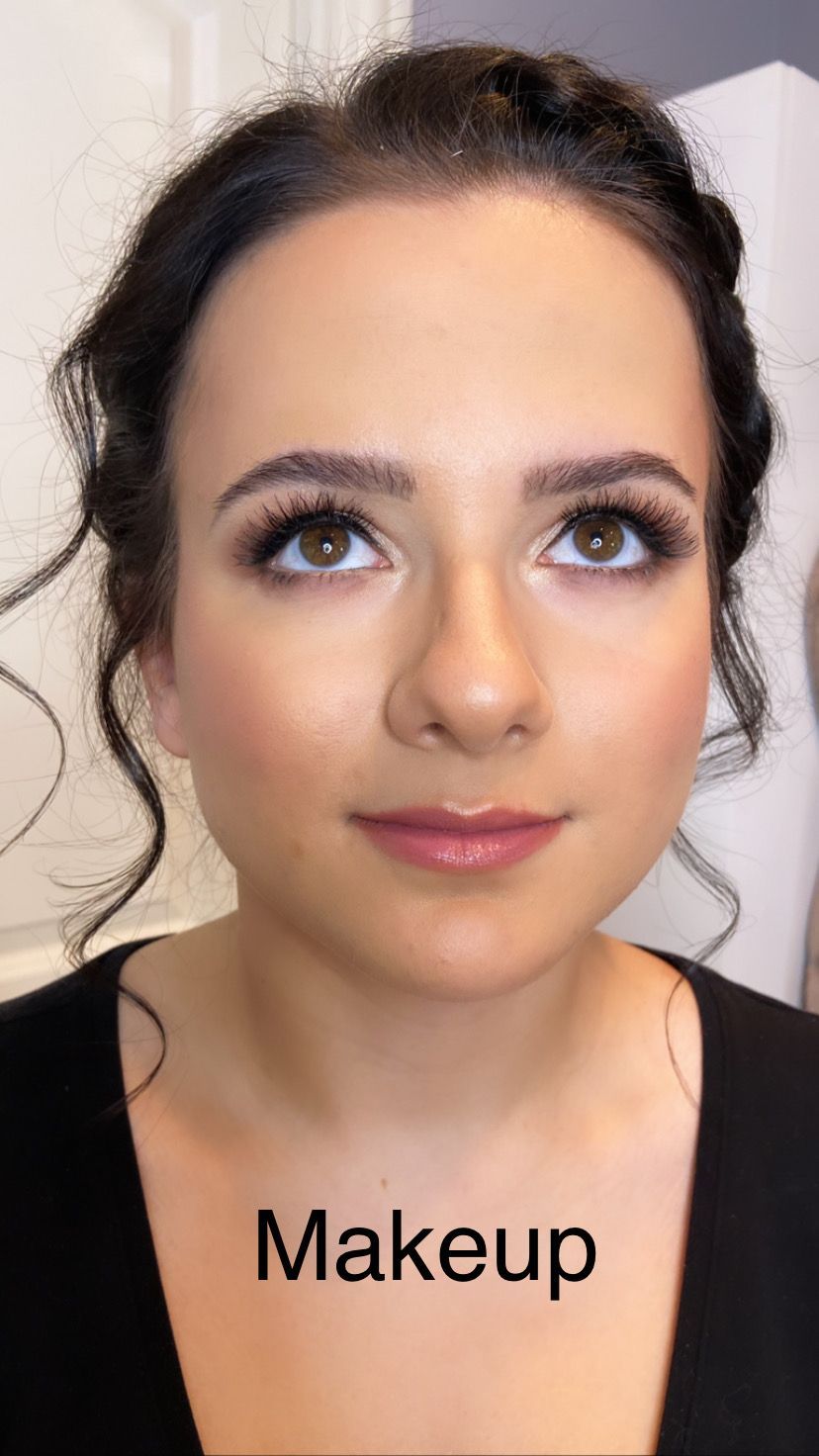 A close up of a woman 's face with the word makeup on it.