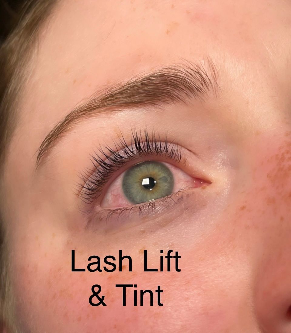 A close up of a woman 's eye with a lash lift and tint.