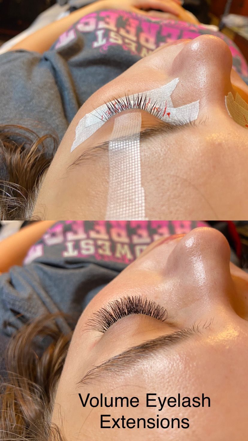 A woman is getting eyelash extensions in a beauty salon.