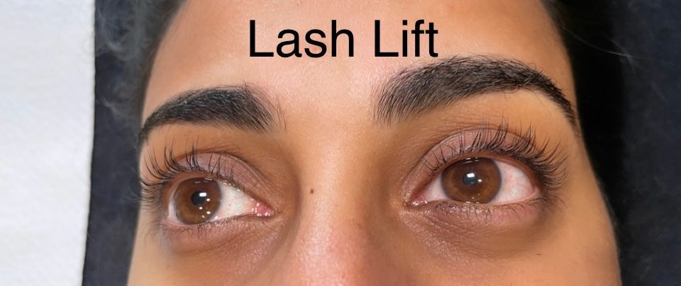 A close up of a woman 's eyes with the words lash lift written above them.